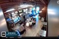 Four masked individuals remove Israeli flags at a Philadelphia cafe. - SarkariResult