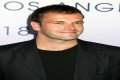 Jonny Lee Miller flashes ink for Ellen charity